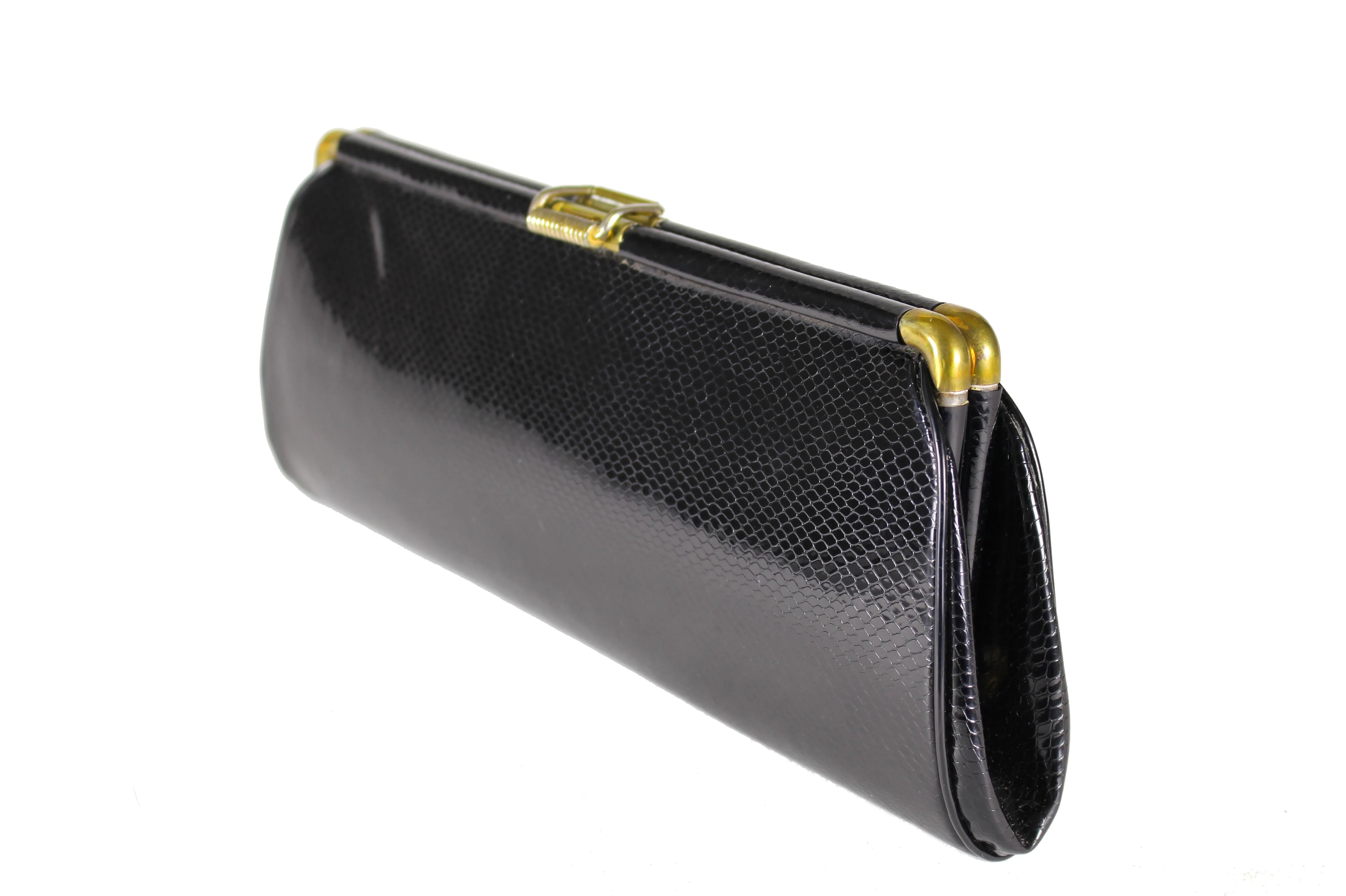 Elongated black snakeskin print clutch